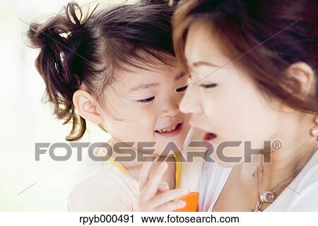 Japanese mother and daughter View Large Photo Image Stock Image - Japanese mother and daughter. Fotosearch