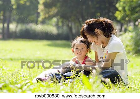Japanese mother and daughter View Large Photo Image Stock Image - Japanese mother and daughter. Fotosearch