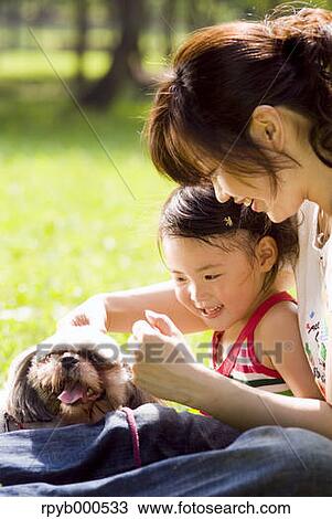 Stock Image - Japanese mother and daughter. Fotosearch