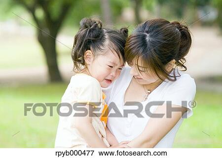 Stock Photo - Japanese mother and daughter. Fotosearch