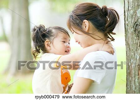 Japanese mother and daughter View Large Photo Image Stock Photo - Japanese mother and daughter. Fotosearch