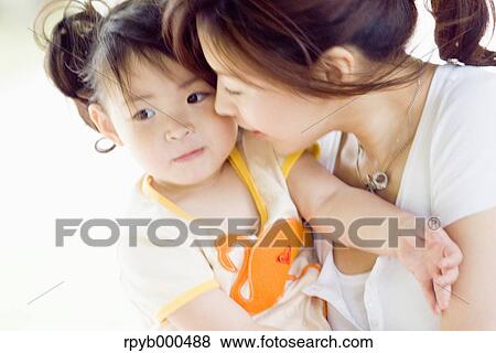 Stock Photo - Japanese mother and daughter. Fotosearch