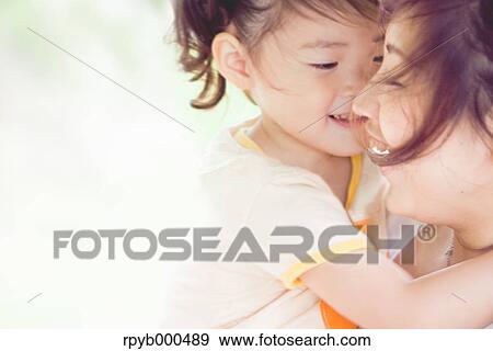 Stock Photo - Japanese mother and daughter. Fotosearch