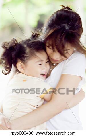 Japanese mother and daughter View Large Photo Image Stock Photograph - Japanese mother and daughter. Fotosearch