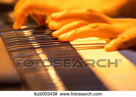 Playing piano View Large Photo Image Stock Photo - Playing piano. Fotosearch