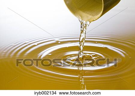 Pouring rice wine View Large Photo Image Picture - Pouring rice wine. Fotosearch