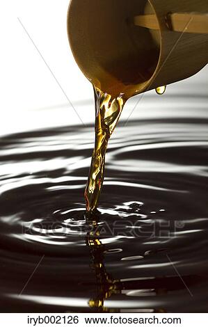 Pouring soup View Large Photo Image Stock Photograph - Pouring soup. Fotosearch