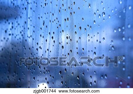 Picture - Raindrops on glass. Fotosearch