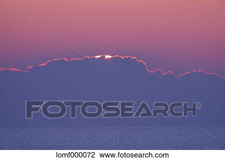 Stock Image - Sea at sunrise, Hokkaido. Fotosearch