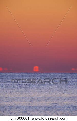 Sea at sunrise View Large Photo Image Stock Image - Sea at sunrise. Fotosearch