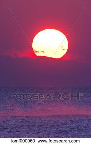 Stock Image - Sea at sunrise. Fotosearch