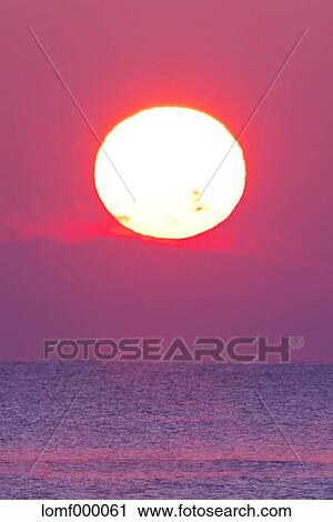 Sea at sunrise View Large Photo Image Stock Image - Sea at sunrise. Fotosearch