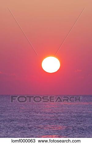 Sea at sunrise View Large Photo Image Stock Image - Sea at sunrise. Fotosearch