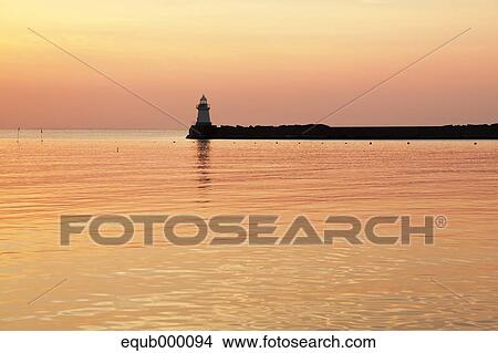 Sea at sunset View Large Photo Image Picture - Sea at sunset. Fotosearch