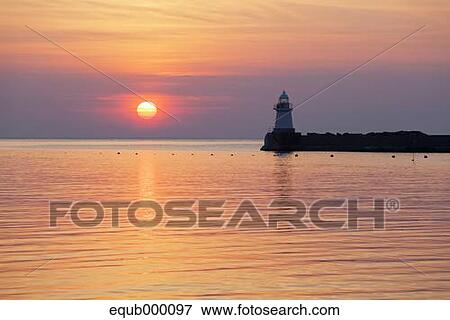 Stock Photo - Sea at sunset. Fotosearch