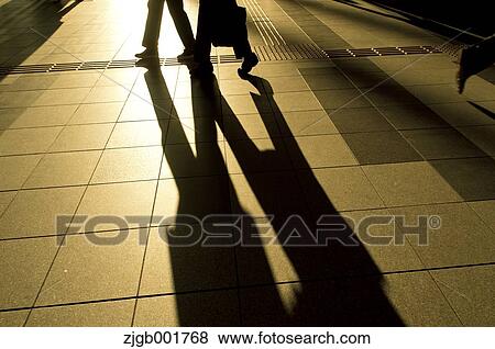 Silhouette of people walking View Large Photo Image Stock Photo - Silhouette of people walking. Fotosearch