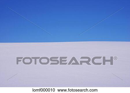 Snow field and blue sky View Large Photo Image Stock Image - Snow field and blue sky. Fotosearch