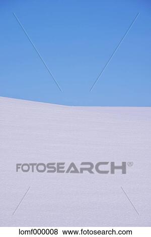 Snow field and blue sky View Large Photo Image Stock Photo - Snow field and blue sky. Fotosearch