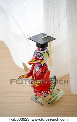 Tin toy by the window View Large Photo Image Stock Image - Tin toy by the window. Fotosearch