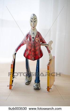 Tin toy by the window View Large Photo Image Stock Image - Tin toy by the window. Fotosearch