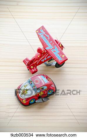 Tin toys by the window View Large Photo Image Picture - Tin toys by the window. Fotosearch