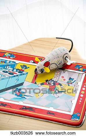 Tin toys by the window View Large Photo Image Stock Photograph - Tin toys by the window. Fotosearch