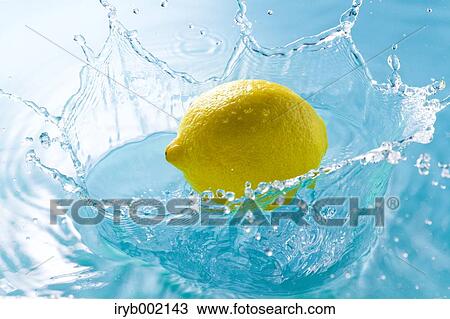 Stock Image - Water and lemon. Fotosearch