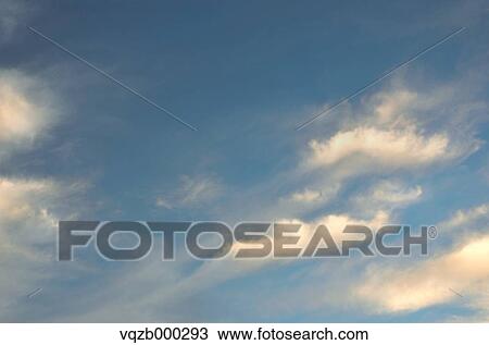 Blue sky with clouds View Large Photo Image Stock Image - Blue sky with clouds. Fotosearch