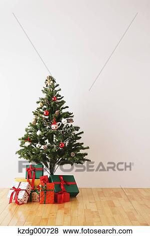 Christmas tree and gift boxes View Large Photo Image Stock Photo - Christmas tree and gift boxes. Fotosearch