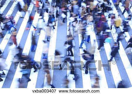 Crowd of pedestrians walking View Large Photo Image Stock Photo - Crowd of pedestrians walking. Fotosearch