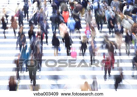 Crowd of pedestrians walking View Large Photo Image Stock Photo - Crowd of pedestrians walking. Fotosearch