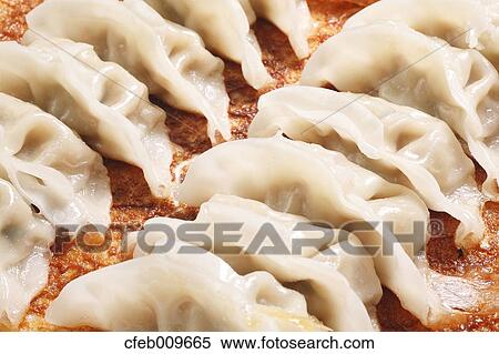 Fried Gyoza dumplings View Large Photo Image Stock Photography - Fried Gyoza dumplings. Fotosearch