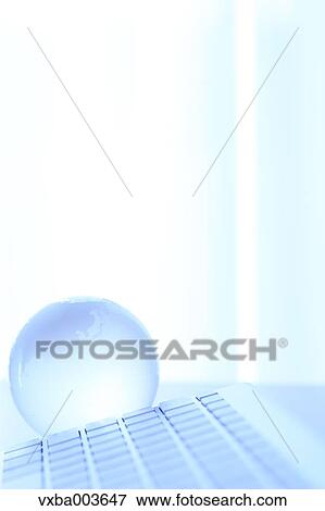 Glass globe and computer View Large Photo Image Stock Photo - Glass globe and computer. Fotosearch