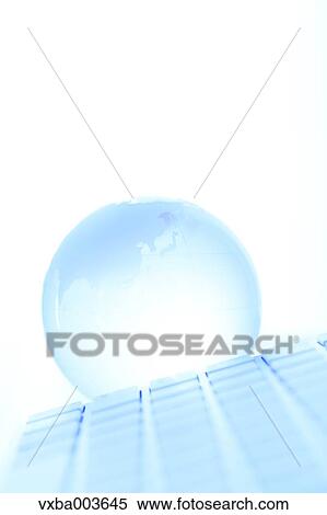 Glass globe and computer View Large Photo Image Stock Photography - Glass globe and computer. Fotosearch