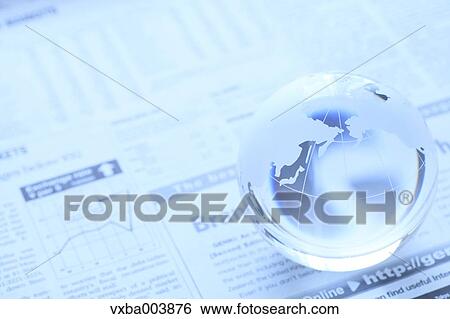 Glass globe and newspaper View Large Photo Image Stock Photograph - Glass globe and newspaper. Fotosearch