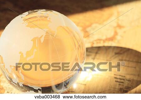 Glass globe on map View Large Photo Image Stock Photo - Glass globe on map. Fotosearch