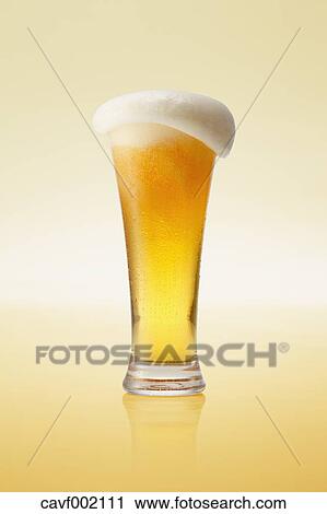 Stock Image - Glass of beer. Fotosearch