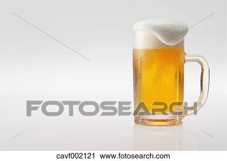 Stock Image - Glass of beer. Fotosearch