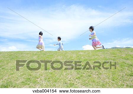 Japanese kids on a hill View Large Photo Image Picture - Japanese kids on a hill. Fotosearch