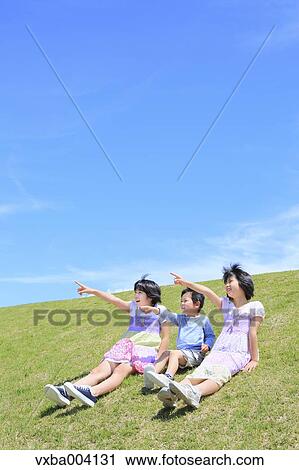 Japanese kids on a hill View Large Photo Image Stock Image - Japanese kids on a hill. Fotosearch