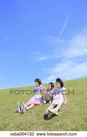 Japanese kids on a hill View Large Photo Image Stock Image - Japanese kids on a hill. Fotosearch