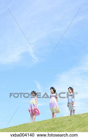 Japanese kids on a hill View Large Photo Image Stock Image - Japanese kids on a hill. Fotosearch