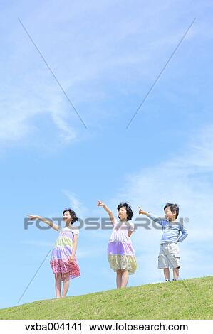 Japanese kids on a hill View Large Photo Image Stock Image - Japanese kids on a hill. Fotosearch