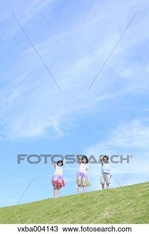 Japanese kids on a hill View Large Photo Image Stock Image - Japanese kids on a hill. Fotosearch
