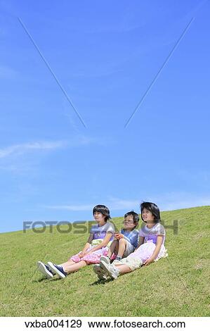 Japanese kids on a hill View Large Photo Image Stock Photo - Japanese kids on a hill. Fotosearch