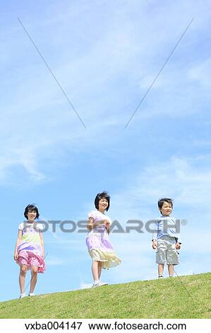 Japanese kids on a hill View Large Photo Image Stock Photo - Japanese kids on a hill. Fotosearch