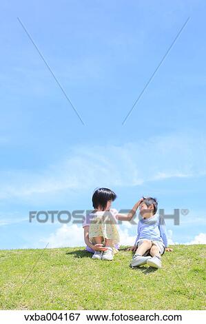Japanese kids on a hill View Large Photo Image Stock Photo - Japanese kids on a hill. Fotosearch