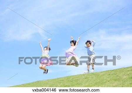 Stock Photograph - Japanese kids on a hill. Fotosearch