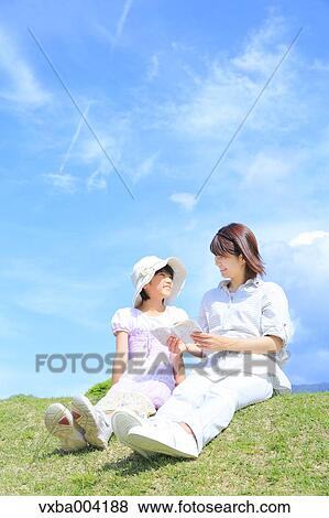 Japanese mum and daughter on a hill View Large Photo Image Stock Photo - Japanese mum and daughter on a hill. Fotosearch