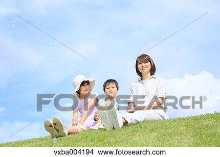 Japanese mum and kids on a hill View Large Photo Image Picture - Japanese mum and kids on a hill. Fotosearch